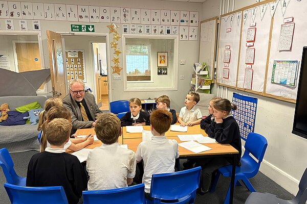 Brian with students in Broughton Gifford