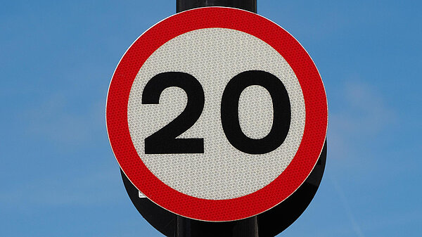 Twenty miles per hour speed sign.
